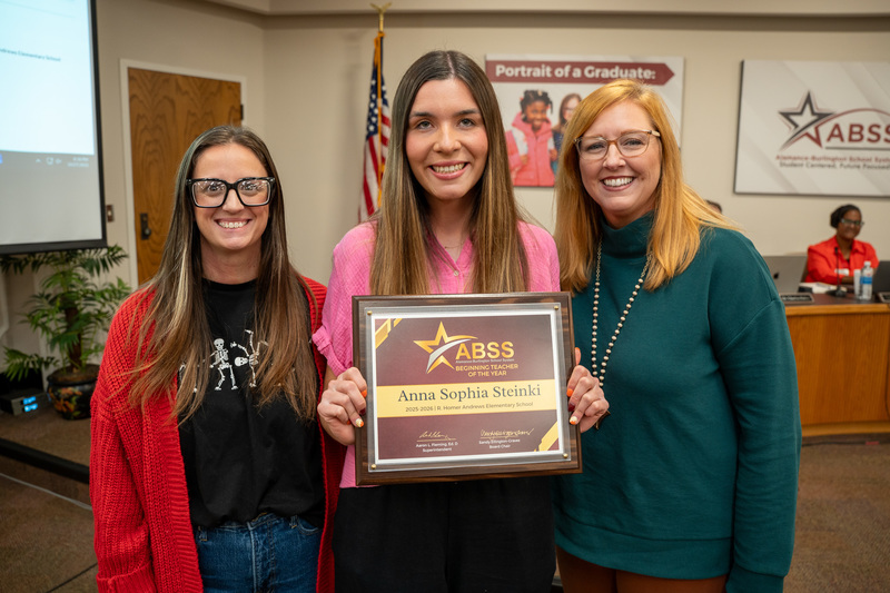 Anna Steinki and her school administrators together at the Board meeting