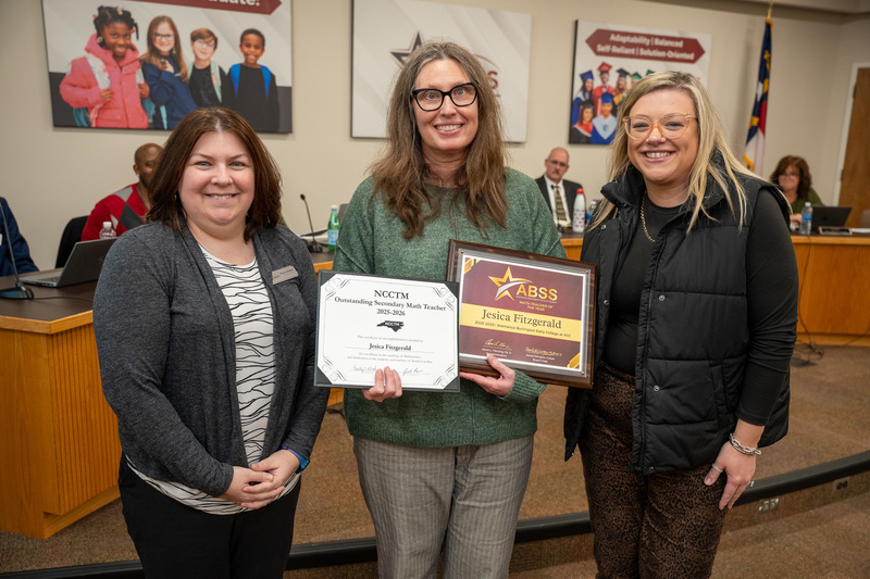 Jesica Fitzgerald standing with Principal Whitney Fliehman and Science Coordinator Erica Bowman