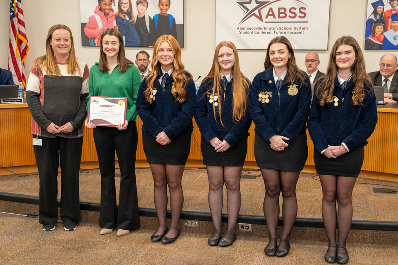 Southern Alamance FFA Floriculture members standing in front of board room during recognitions