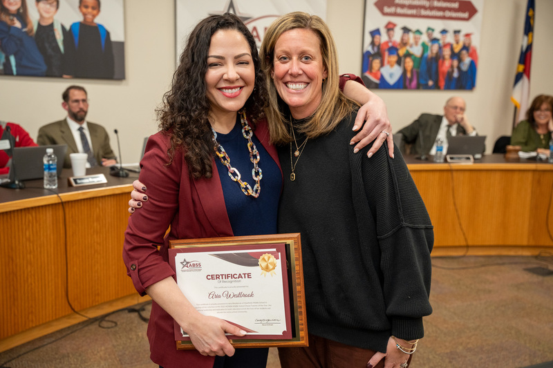 Aria Westbrook standing with Principal Lauren Acome during recognitions
