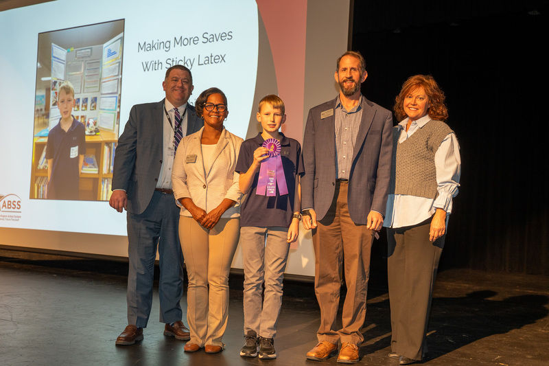 Jett Hutchins with Board members and Dr. Fleming