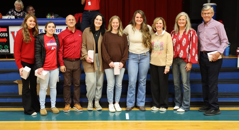 Former bball players smiling