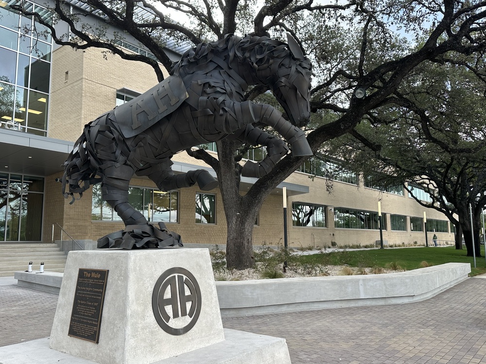Mule statue in front of high school building