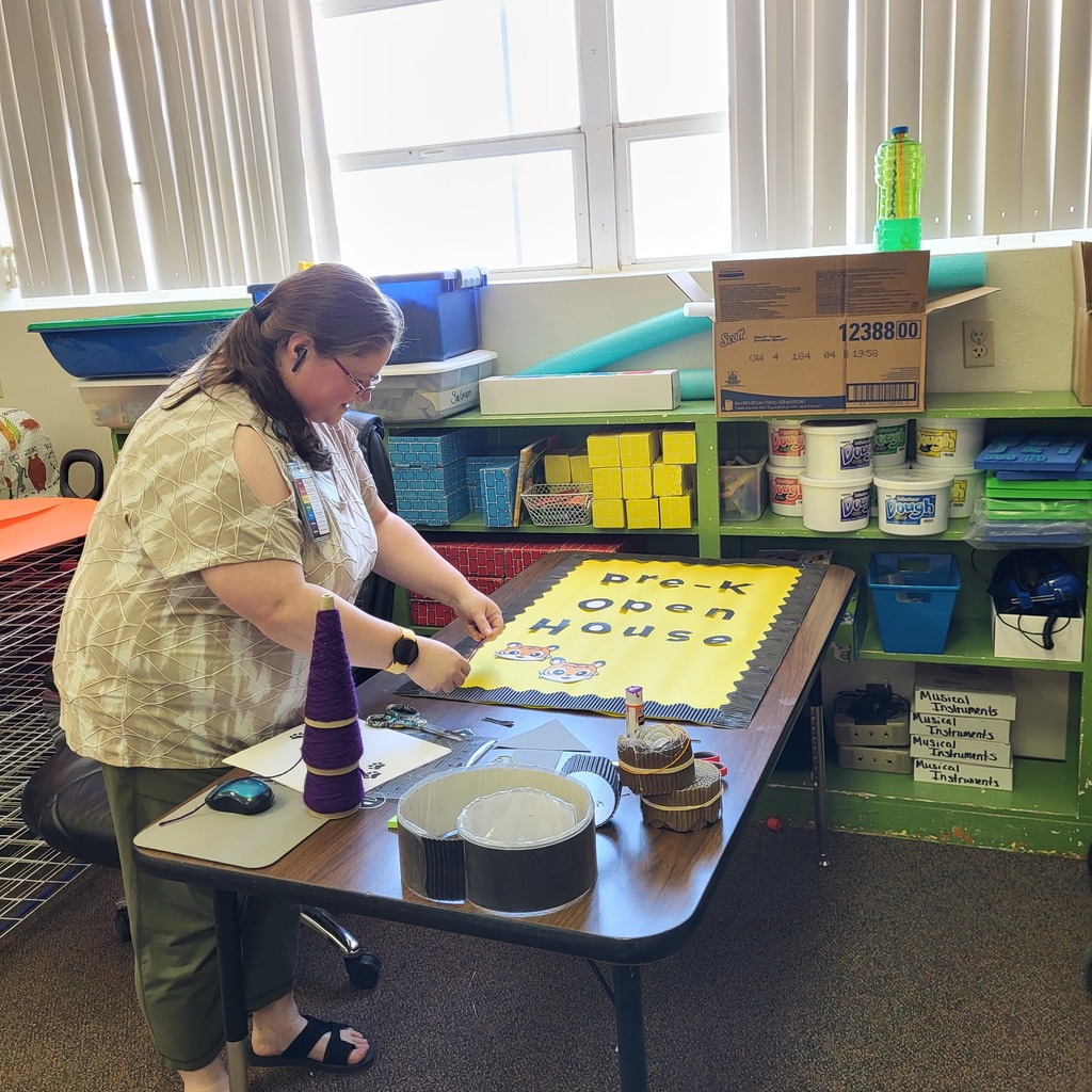 Staff Member Working on Poster 