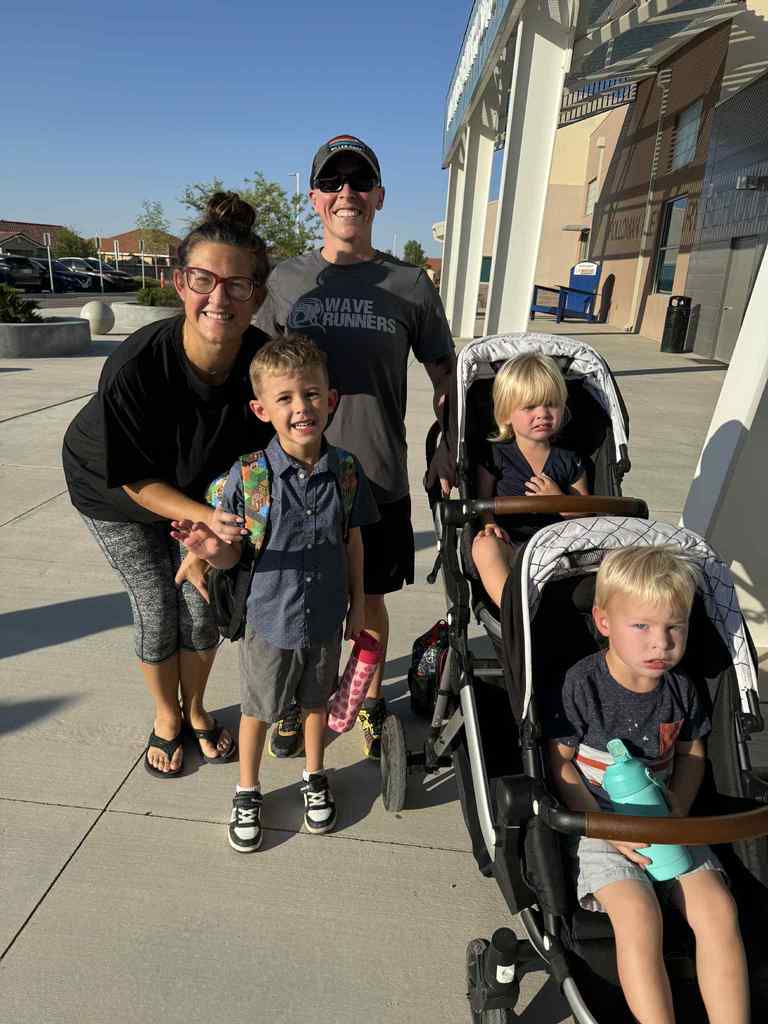 family dropping off student at school