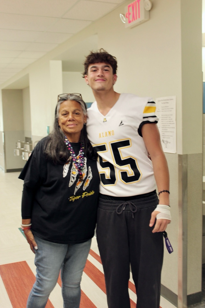SHE Mrs. Arnold with AHS Football player