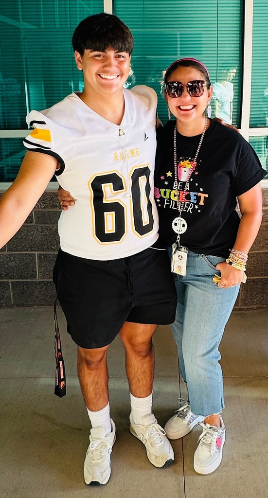 Mrs. Wolfe and her son in front of Desert Star.