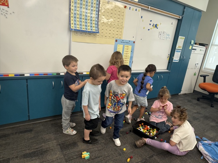 students working with Legos
