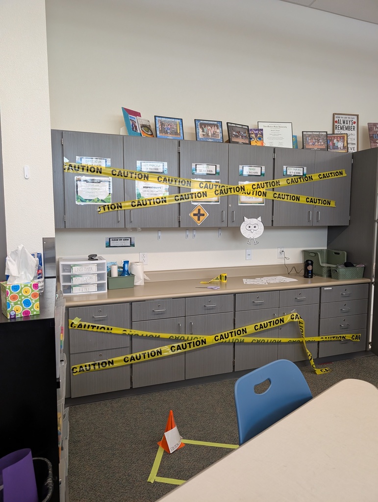 caution tape on shelves for fun engineering class during math block.