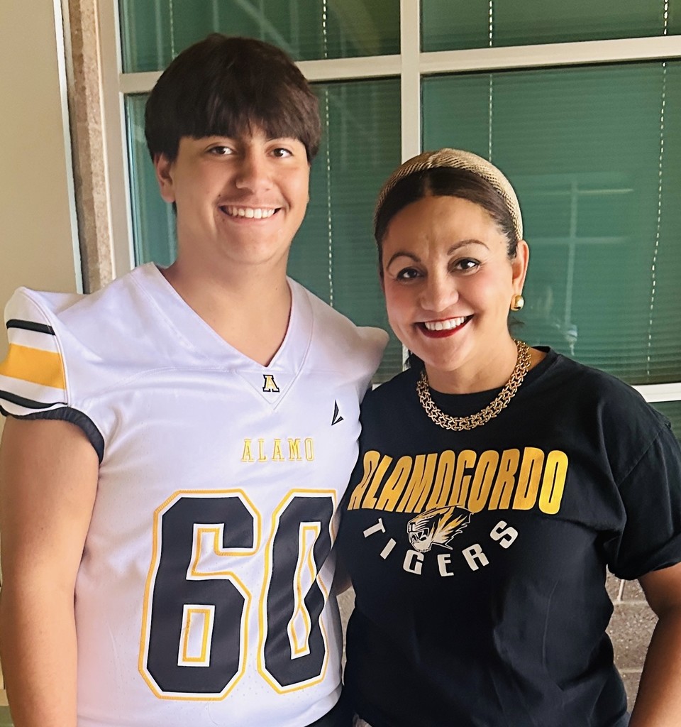 Mrs. Wolfe and her son in front of Desert Star.