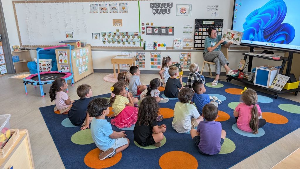 pre-k class listening to a story being read