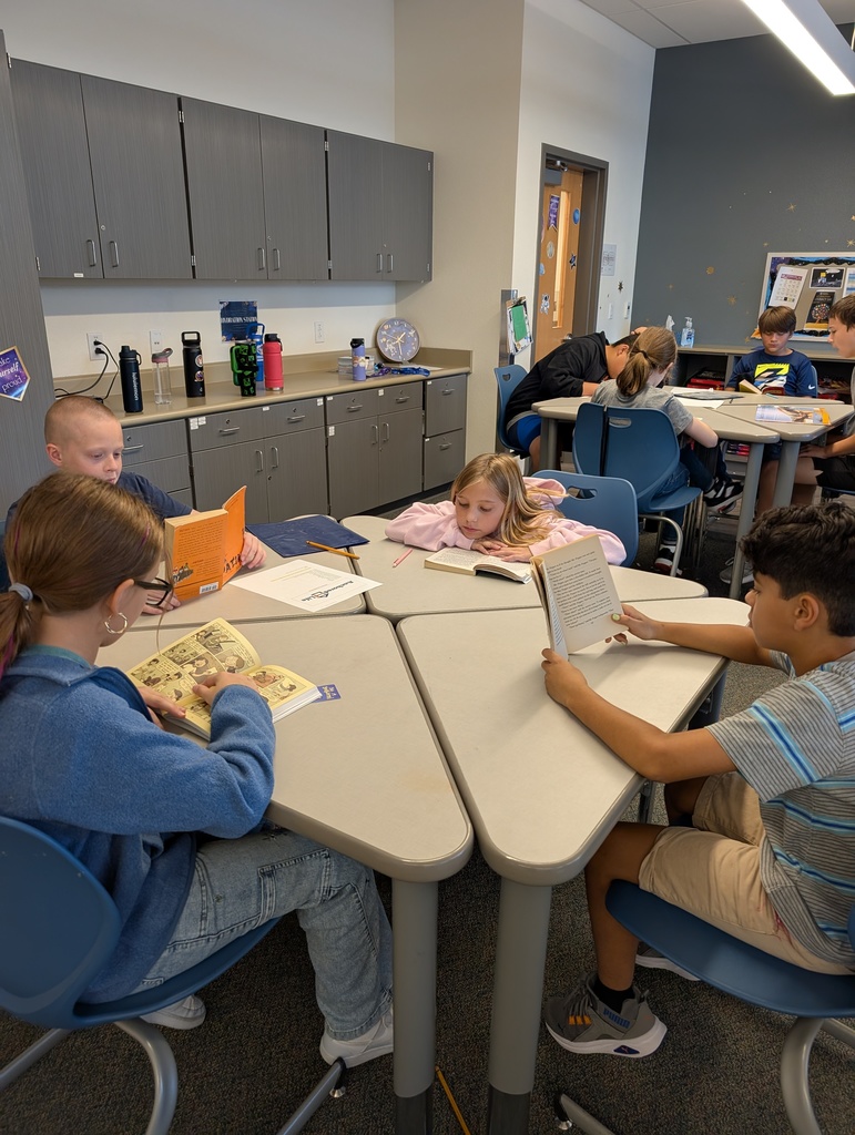 Students engrossed in reading