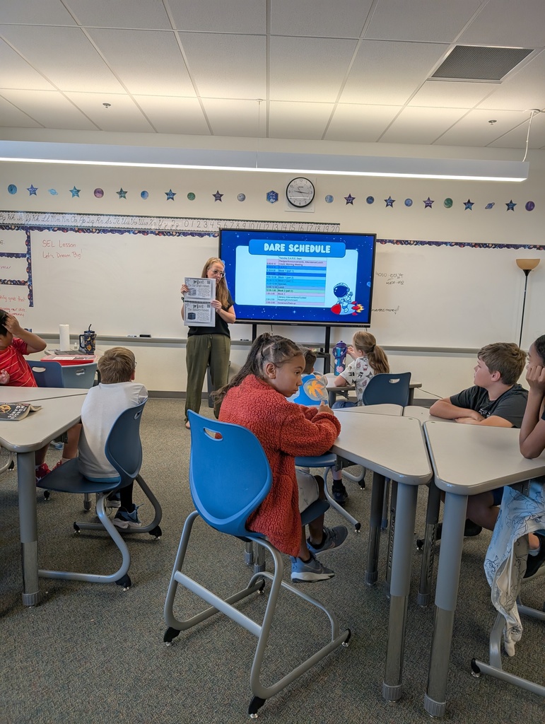 educator instructing how the STEM activity will go