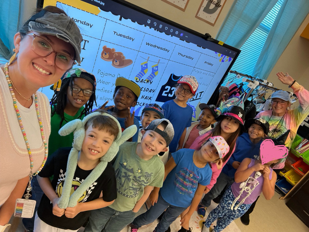 Mrs.  Mendoza and her students on hat day