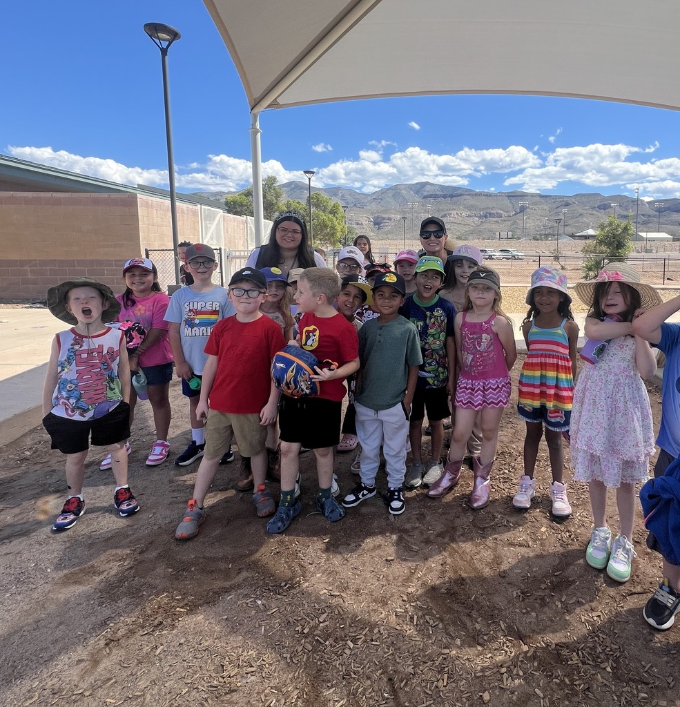 Mrs. Cunningham and Ms. Bustamante with students on hat day.