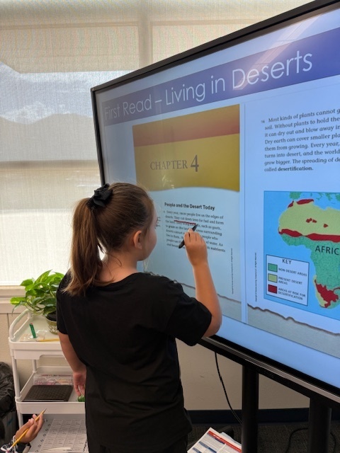 Student working on Analyzing text