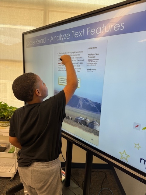 Student working on Analyzing text