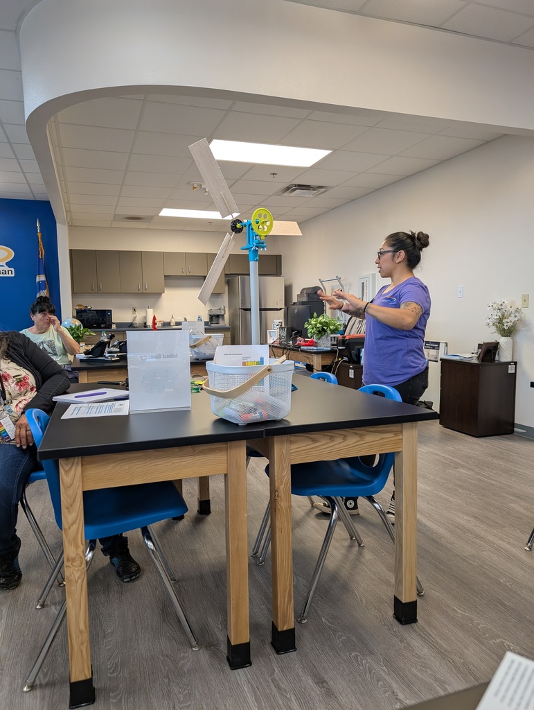 educator talking to other educators