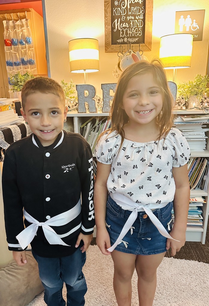 First Graders excited to get their new belts.