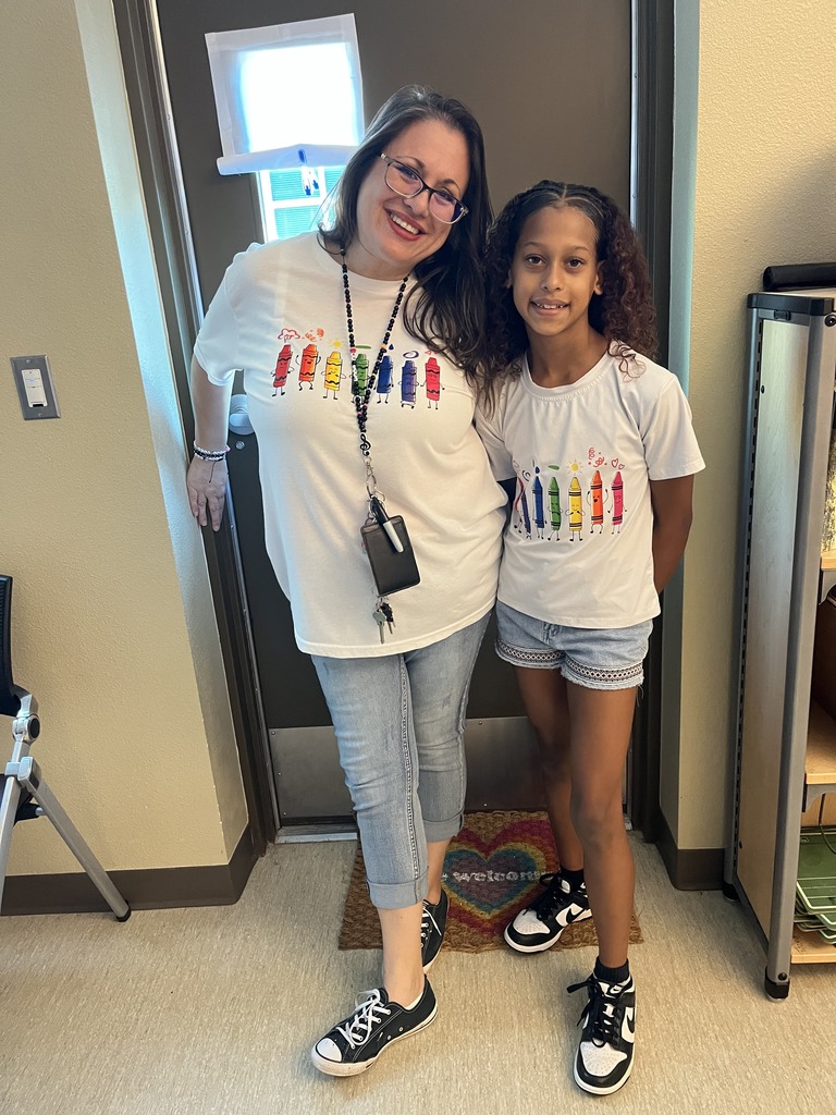 Ms. Shay with a student.