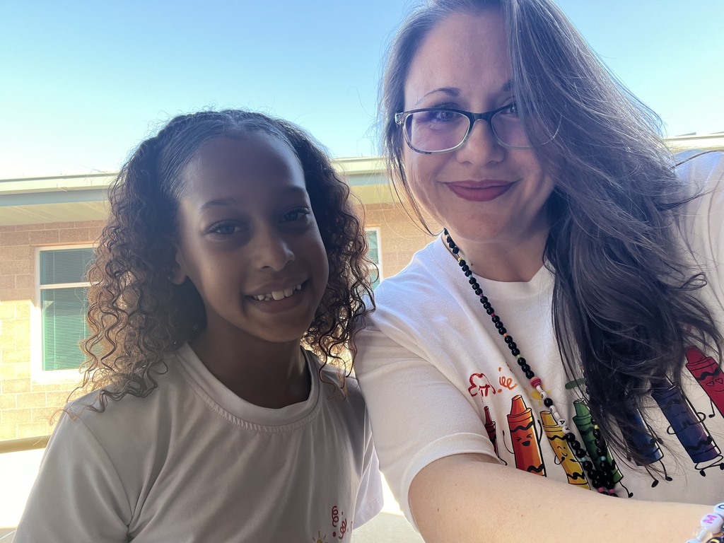 Ms. Shay with a student.