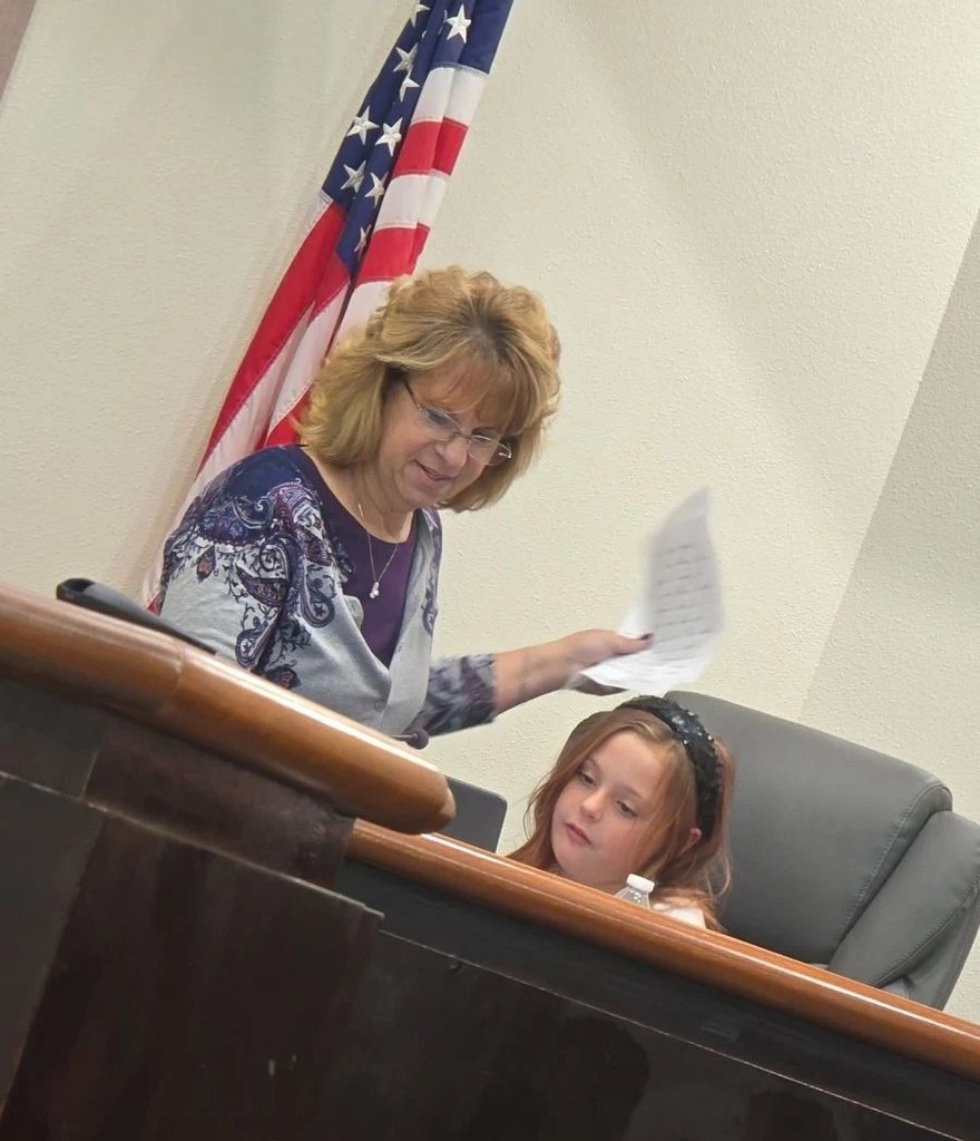 Sunset Hills Elementary student with Alamogordo's Mayor at the commission meeting
