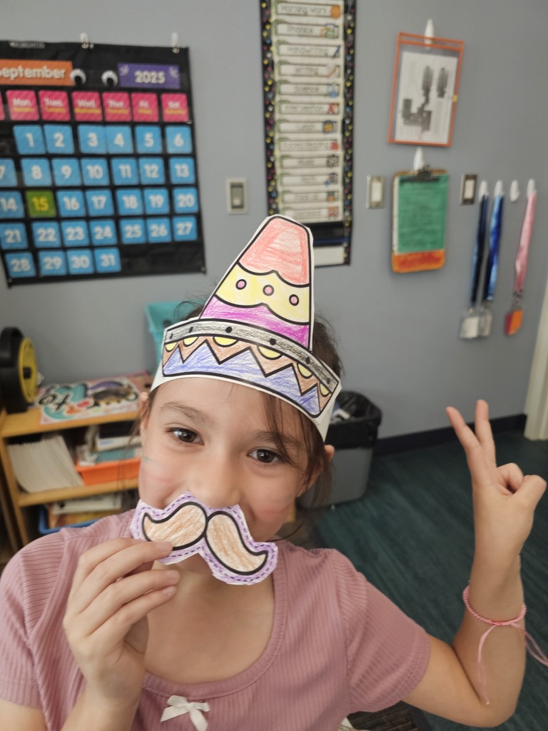 One student with a hat and mustache.