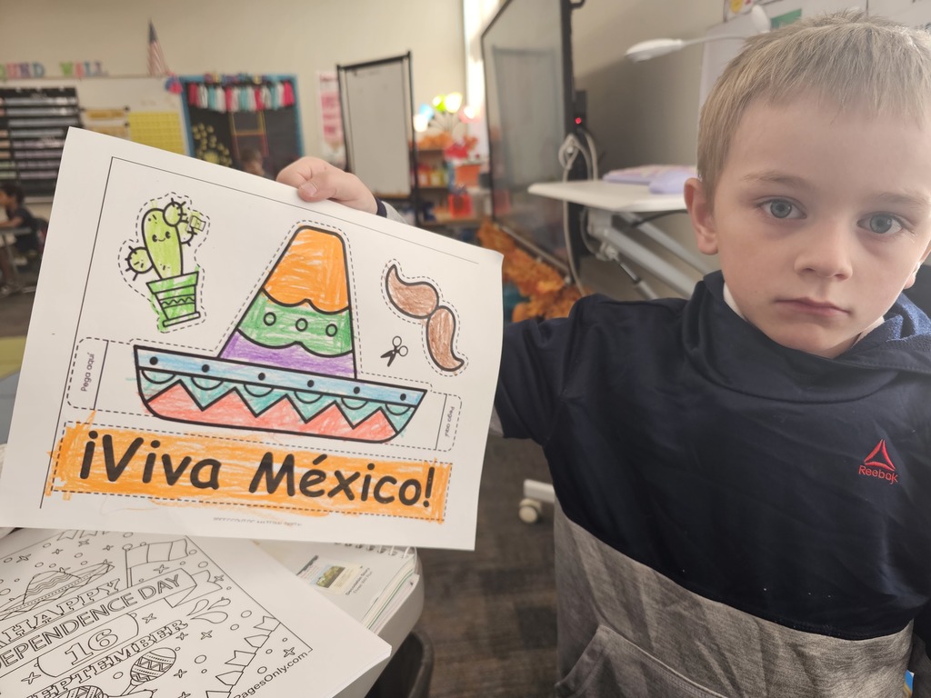 student with a viva mexico coloring