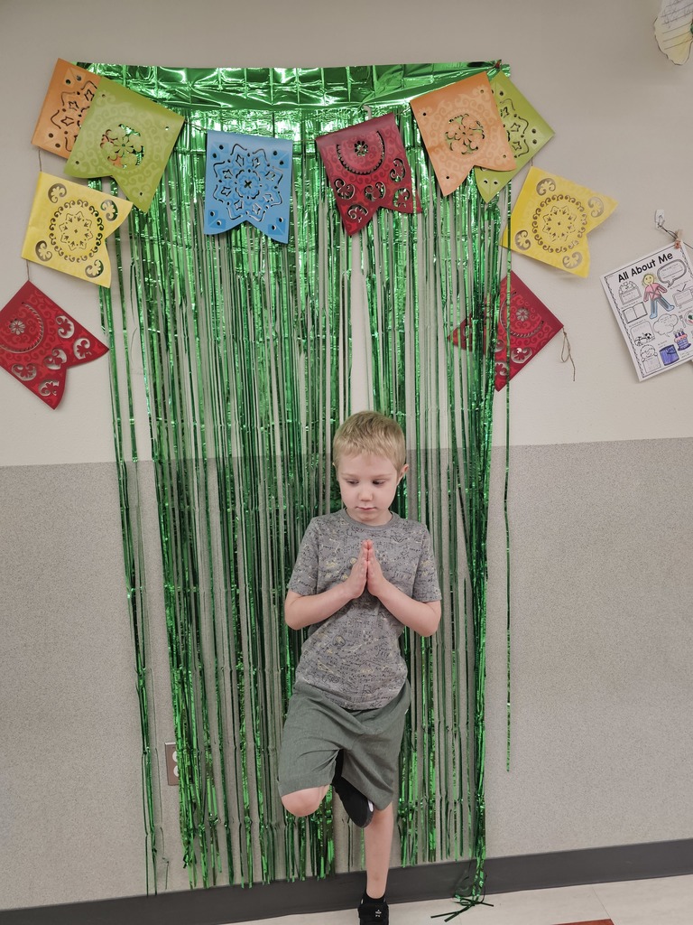 One student doing a pose