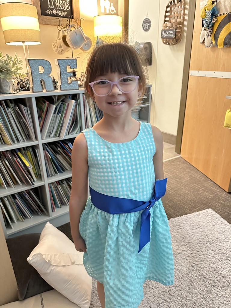 Alyssa with her blue belt.