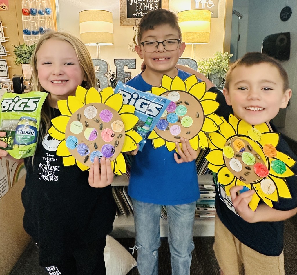 Students with sunflowers
