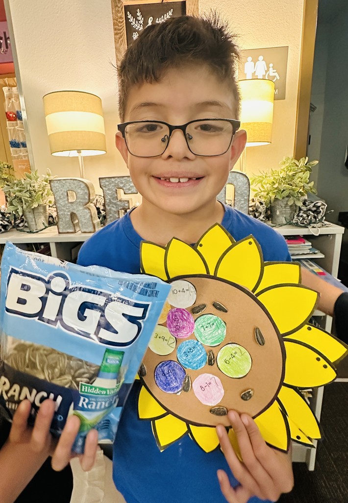 Student with sunflower