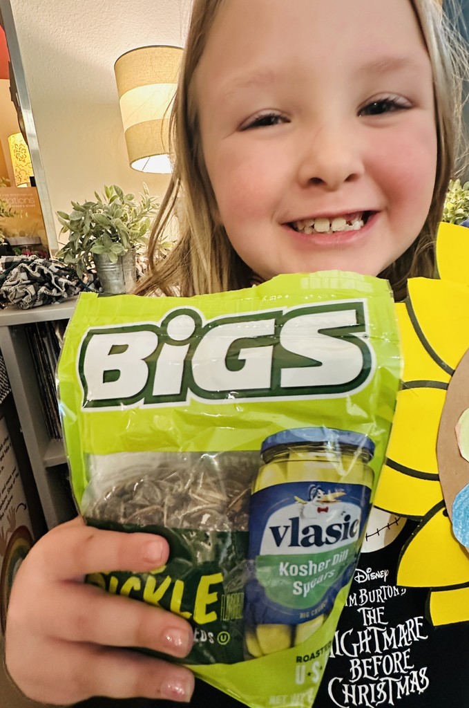 Student with sunflower seeds