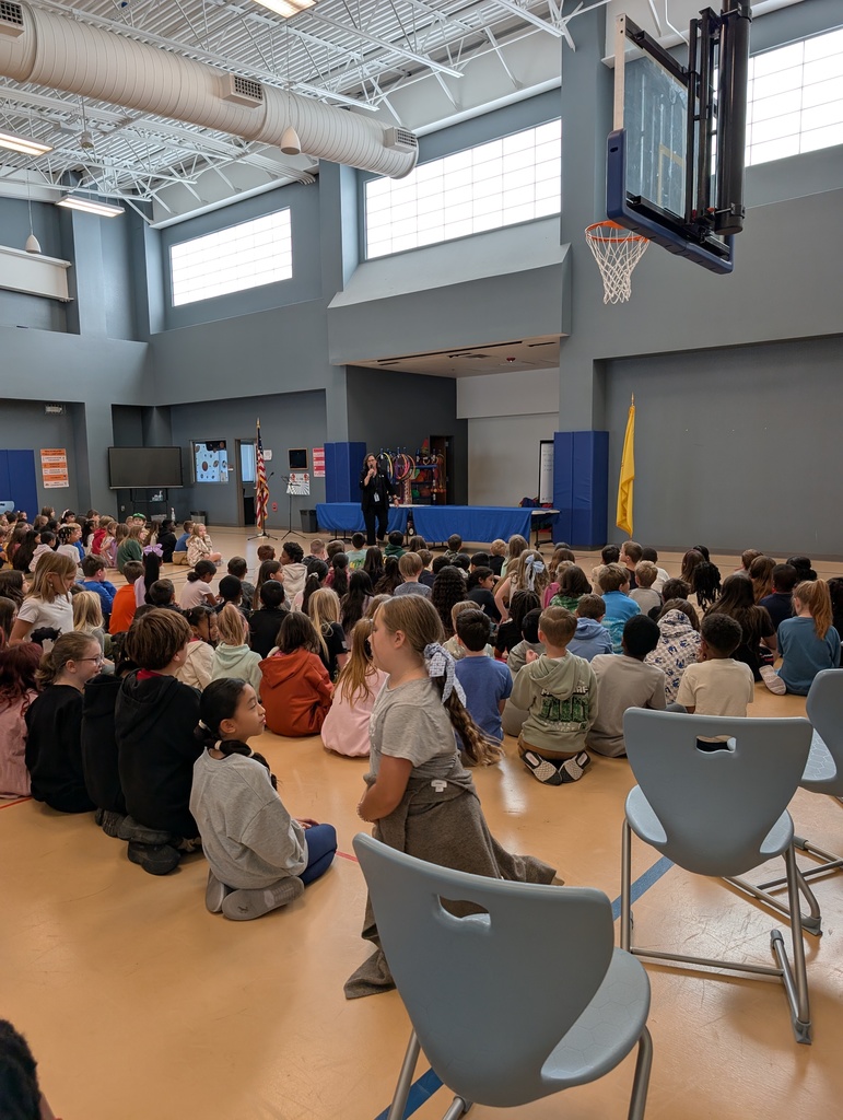 student recieving quarter awards at an assembly