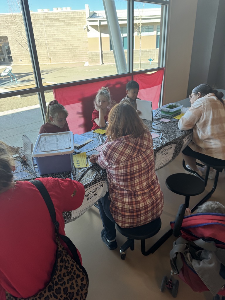 students sharing writing ideas. 