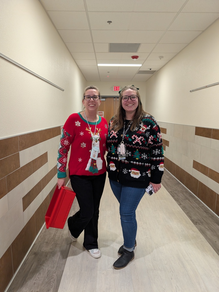 Staff proud of their christmas sweaters