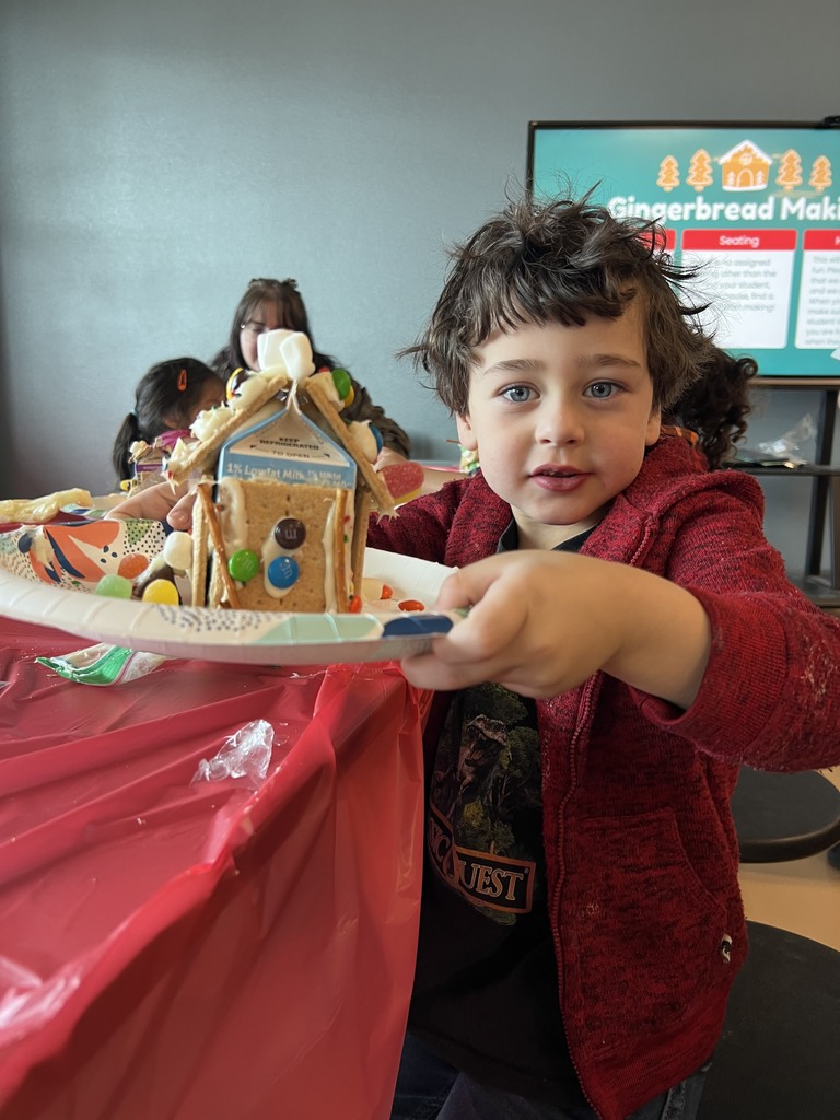 student showing off their building skills