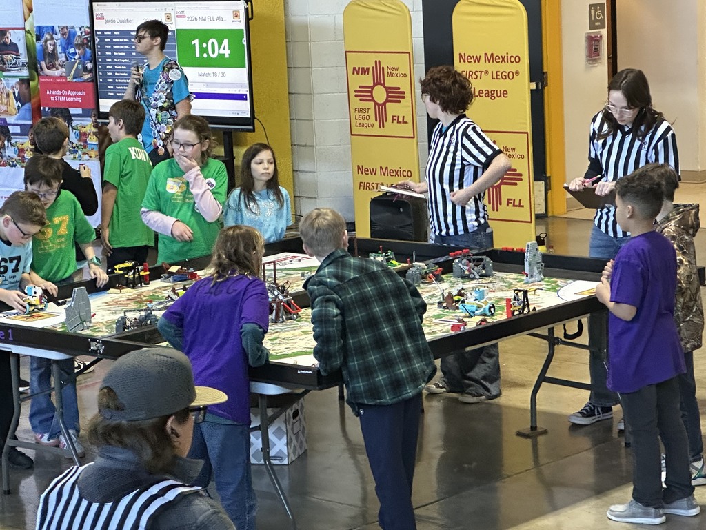 students and referees running code