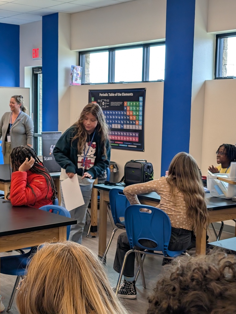 student walking to their seat