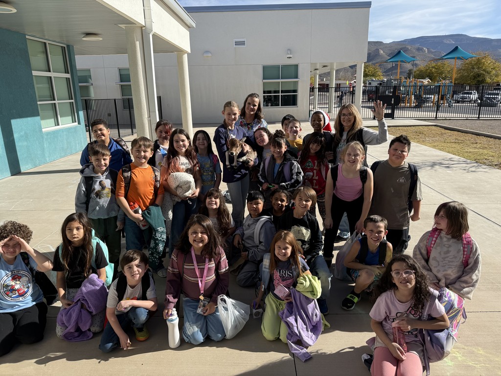 3rd grade group photo with cow