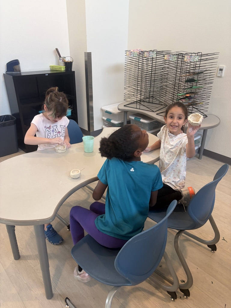 Students having fun with clay