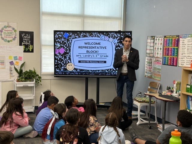 J. Block visiting 3rd grade classroom