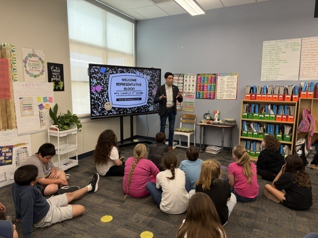 J. Block visiting 3rd grade classroom