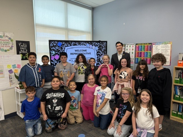 J. Block visiting 3rd grade classroom