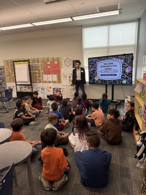 J. Block visiting 3rd grade classroom