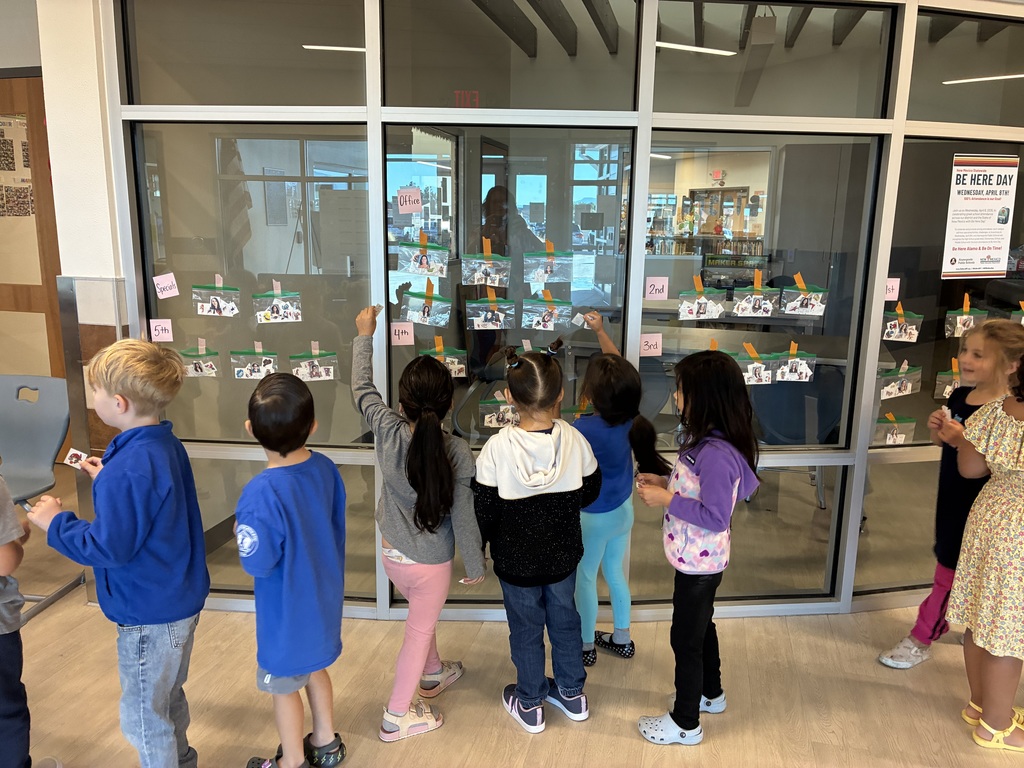 students choosing staff to tattoo