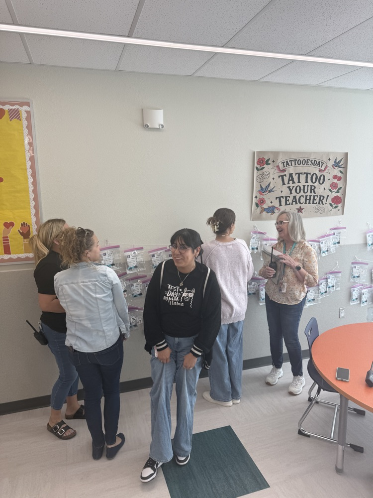 teachers checking tattoo bags