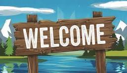A rustic wooden sign that reads "WELCOME" in bold white letters, set in an animated outdoor landscape with trees, mountains, and a lake under a blue sky.