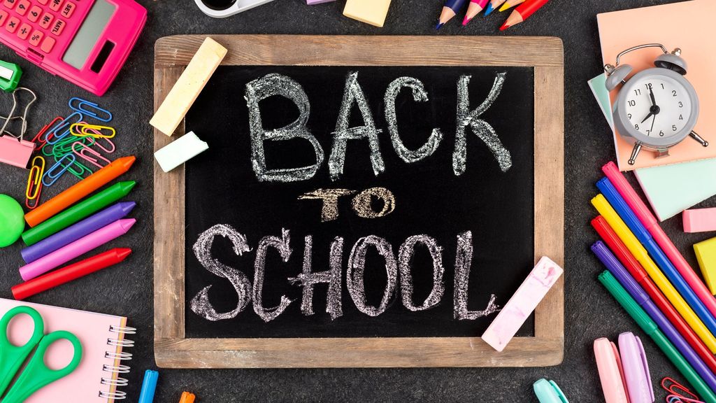 Back to school chalk board with school supplies