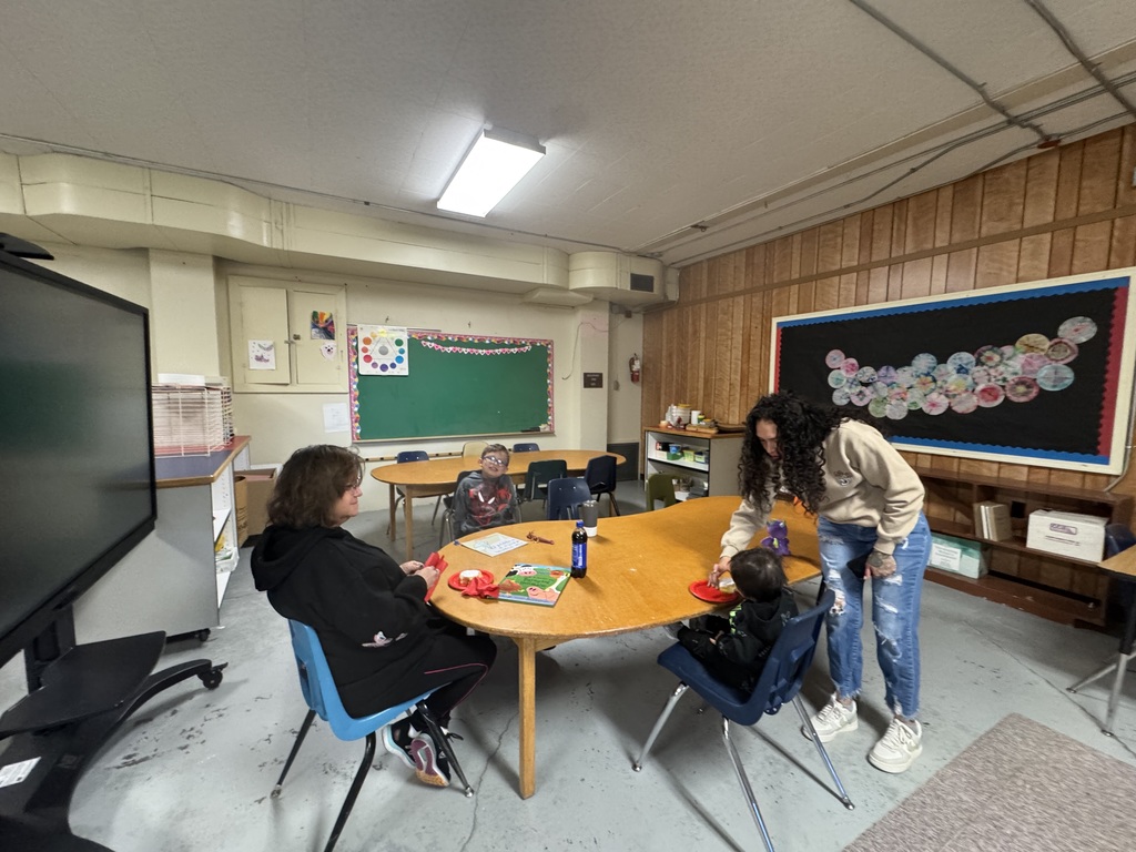 Students eating breakfast with family